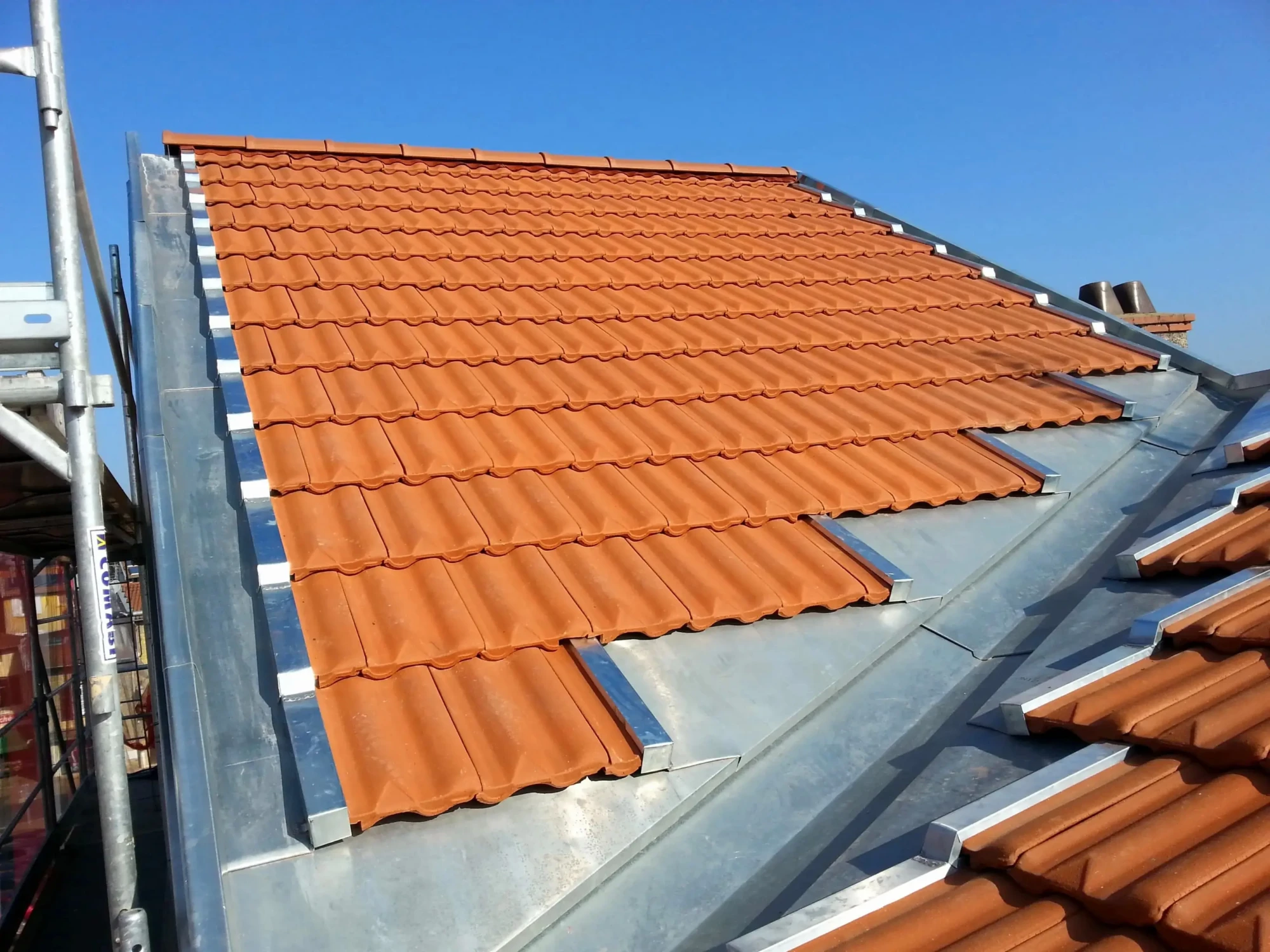 couvreur zingueur Annecy proposant un devis gratuit et personnalisé pour vos travaux de zinguerie